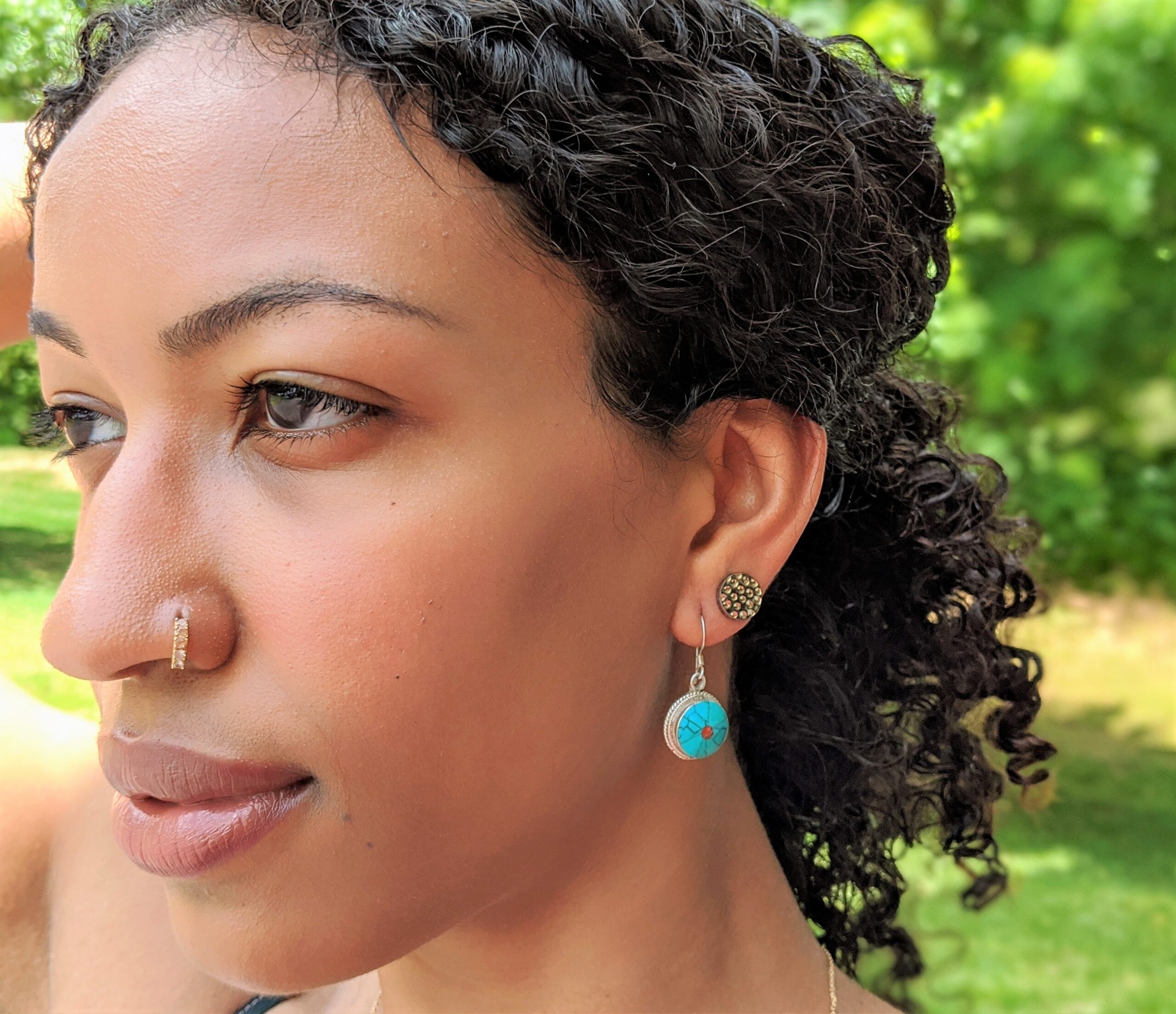 Girl wearing turquoise earring
