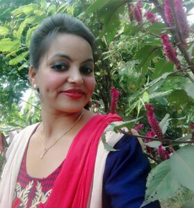 Woman in kurta in garden.